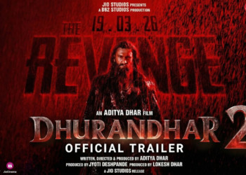 धुरंधर 2 का ऑफिशियल ट्रेलर पोस्टर – रणवीर सिंह हमजा के रूप में बारिश में भीगे हुए, रेड बैकग्राउंड के साथ "The Revenge" टाइटल। रिलीज डेट 19 मार्च 2026 | Dhurandhar 2 Teaser