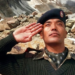 Sonam Wangchuk लायन ऑफ लदाख, कारगिल वार हीरो पहाड़ी बैकग्राउंड में सैल्यूट करते हुए – लद्दाख स्काउट्स के वीर सैनिक की तस्वीर