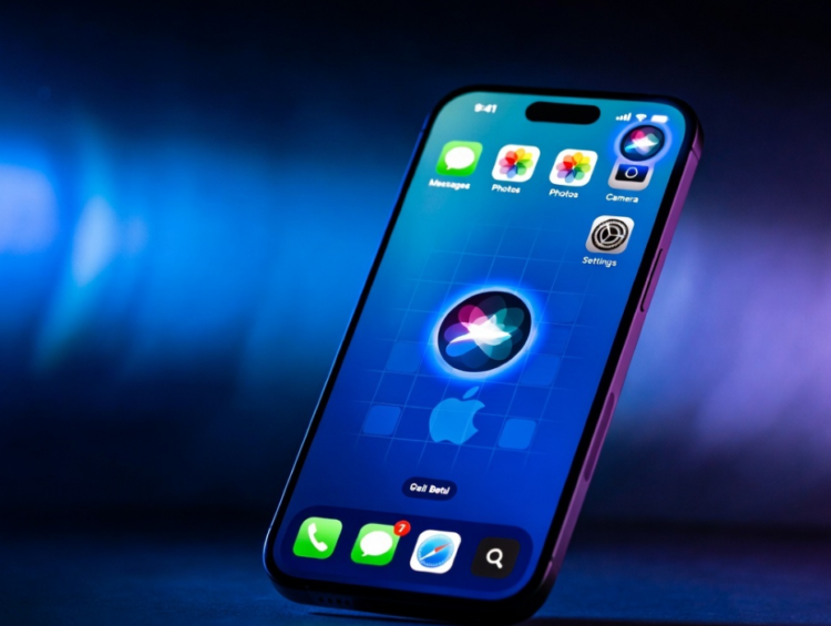 iOS 27 beta का नया लोगो और Liquid Glass इफेक्ट दिखाता हुआ iPhone 16 स्क्रीनशॉट